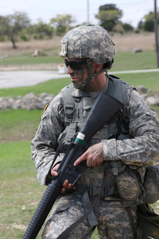 Army Reserve Staff Sgt. Nicholas Minior, a drill sergeant with 3rd Brigade, 98th Training Division (Initial Entry Training), scans his sector during the Warrior Training Task portion of the 108th Training Command (IET) 2017 Drill Sergeant of the Year Competition at Camp Bullis, Texas, March 19-24, 2017.  (U.S. Army Reserve Photo by Maj. Michelle Lunato/released)