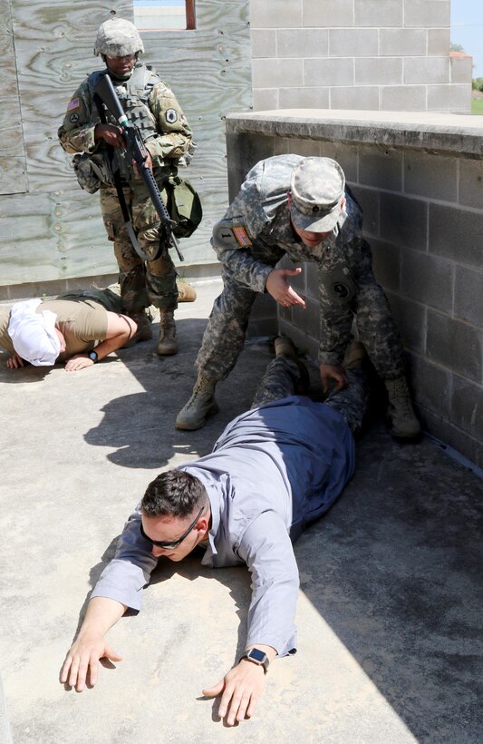 Army Reserve Staff Sgt. Brian Johnson, a Charlotte, N.C. native and drill sergeant with 1-321st Infantry Regiment, 1st Battalion, 1st Brigade, 98th Training Division (Initial Entry Training), works his way through a Warrior Training Task lane during the 108th Training Command (IET) Drill Sergeant of the Year Competition at Camp Bullis, Texas, March 19-24, 2017. Johnson said he chose to compete in the competition because he was "motivated by excellent leadership and guidance. I feel that regardless of the level of competition that I acheive, I will become a greater asset to my unit and command through the training that I will receive." (U.S. Army Reserve photo by Maj. Michelle Lunato.)