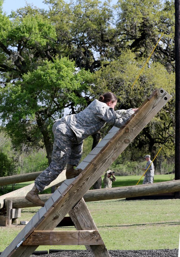 Army Reserve Staff Sgt. Justine Bottorff, a Herkimer, N.Y. native and drill sergeant with Echo Company, 2-389th Infantry Regiment, 3rd Brigade, 98th Training Division (Initial Entry Training), navigates an obstacle during the 108th Training Command (IET) 2017 Drill Sergeant of the Year Competition at Camp Bullis, Texas, March 19-24.  Bottorff won the title of 98th Training Division (IET) Drill Sergeant of the Year. (U.S. Army Reserve Photo by Maj. Michelle Lunato/released)