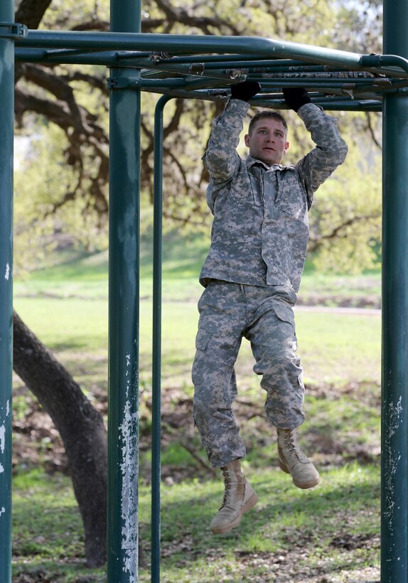 Army Reserve Staff Sgt. Miguel Gallegos, an Omaha, Nebraska native and drill sergeant with Foxtrot Company, 3-485th Battalion, 1st Brigade, 98th Training Division (Initial Entry Training), manuevers through an obstacle during the 108th Training Command (IET) Best Warrior Competition at Camp Bullis, Texas, March 19-24, 2017. Gallegos won the 2017 Noncommissioned Officer of the Year title for the 98th Training Division (IET). (U.S. Army Reserve photo by Maj. Michelle Lunato.)