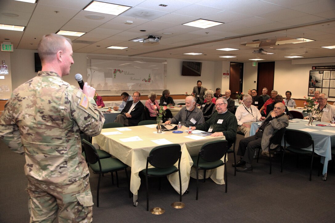 Col. Kirk Gibbs, commander of the Los Angeles District, addresses more than two dozen retirees and current employees during the District's annual Retiree Recognition Day in Los Angeles March 23. Two retirees were inducted into the District's Gallery of Distinguished Civilian Employees; Mary Spencer, former Small Business Program manager, and Richard Leifield, former chief of the Engineering Division.