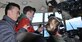 Two Air Force Junior Reserve Officer Training Corps (JROTC) Cadets take pictures on the flight deck of a C-130H Hercules during an orientation flight March 22, 2017. The cadets are with AFJROTC PA-931 at Cathedral Preparatory School, Erie, Pennsylvania. The purpose of the event was to show the cadets some opportunities in the Air Force Reserve. (U.S. Air Force photo/Maj. Polly Orcutt)