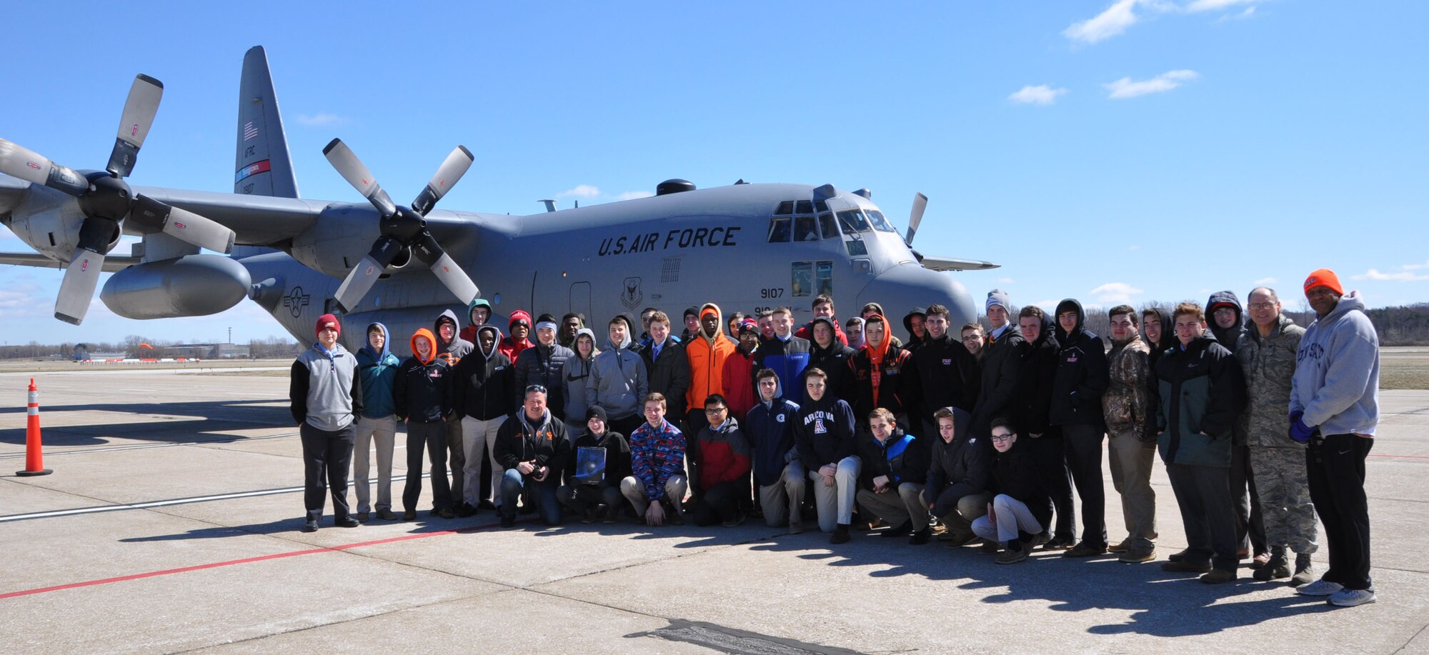 Air Force Junior Reserve Officer Training Corps (AFJROTC) Cadets pose in front of a C-130H Hercules after an orientation flight March 22, 2017. The cadets are with AFJROTC PA-931 at Cathedral Preparatory School, Erie, Pennsylvania. The purpose of the event was to show the cadets some opportunities in the Air Force Reserve. (U.S. Air Force photo/Maj. Polly Orcutt)
