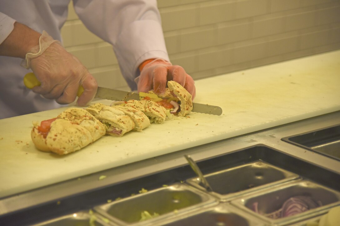 Fairchild’s Warrior and Ross Mission Essential Feeding Facilities launched their healthier, made-to-order options Mar. 27, 2017, at Fairchild Air Force Base, Washington. The options are an expansion on the standard Food Transformation Initiative operation, making Fairchild the third base in the Air Force to incorporate the healthier and cost saving Super Sonic Subs, CIAO Pizza and Big City Grill. (U.S. Air Force photo/Senior Airman Mackenzie Richardson)