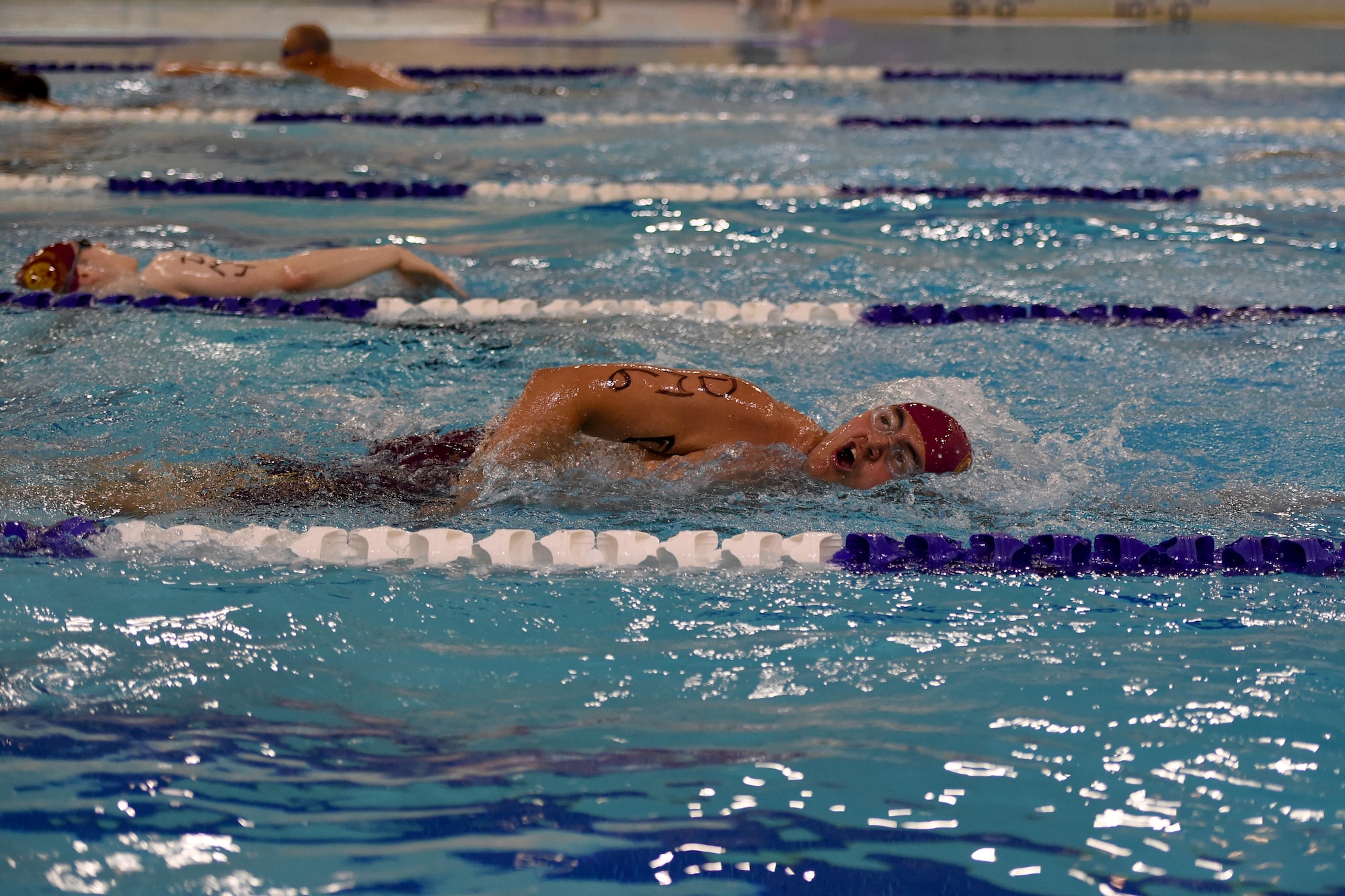 Dimond High School athletes swim laps for ten minutes during the Junior ROTC Indoor Triathlon at Buckner Physical Fitness Center at Joint Base Elmendorf-Richardson, Alaska, March 25, 2017. Nine teams of eight athletes competed in a timed swim, bike and run. The annual event has been hosted at Buckner PFC since January 2005. 