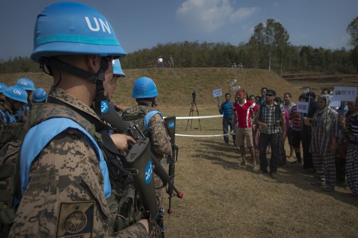 A crowd, acting as protestors, approaches a simulated United Nations camp at exercise Shanti Prayas III in Nepal, Mar. 22, 2017. Shanti Prayas is a multinational U.N. peacekeeping exercise designed to provide pre-deployment training to U.N. partner countries in preparation for real-world peacekeeping operations. 