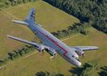 C-54 &#39;Spirit of Freedom&#39; in-flight during a training mission near Warsaw, Indiana in August 2014. The aircraft is owned and operated by the Berlin Airlift Historical Foundation which keeps the aircraft flying and available to the public through important educational outreach and air show appearances. Photo courtesy Greg Morehead.