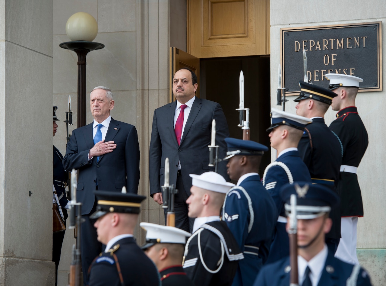 Defense Secretary Jim Mattis and Qatari Defense Minister Khalid bin Mohammed al-Attiyah prepare to enter the Pentagon to discuss the defense relationship between the United States and Qatar, March 27, 2017. DoD photo by Air Force Tech. Sgt. Brigitte N. Brantley