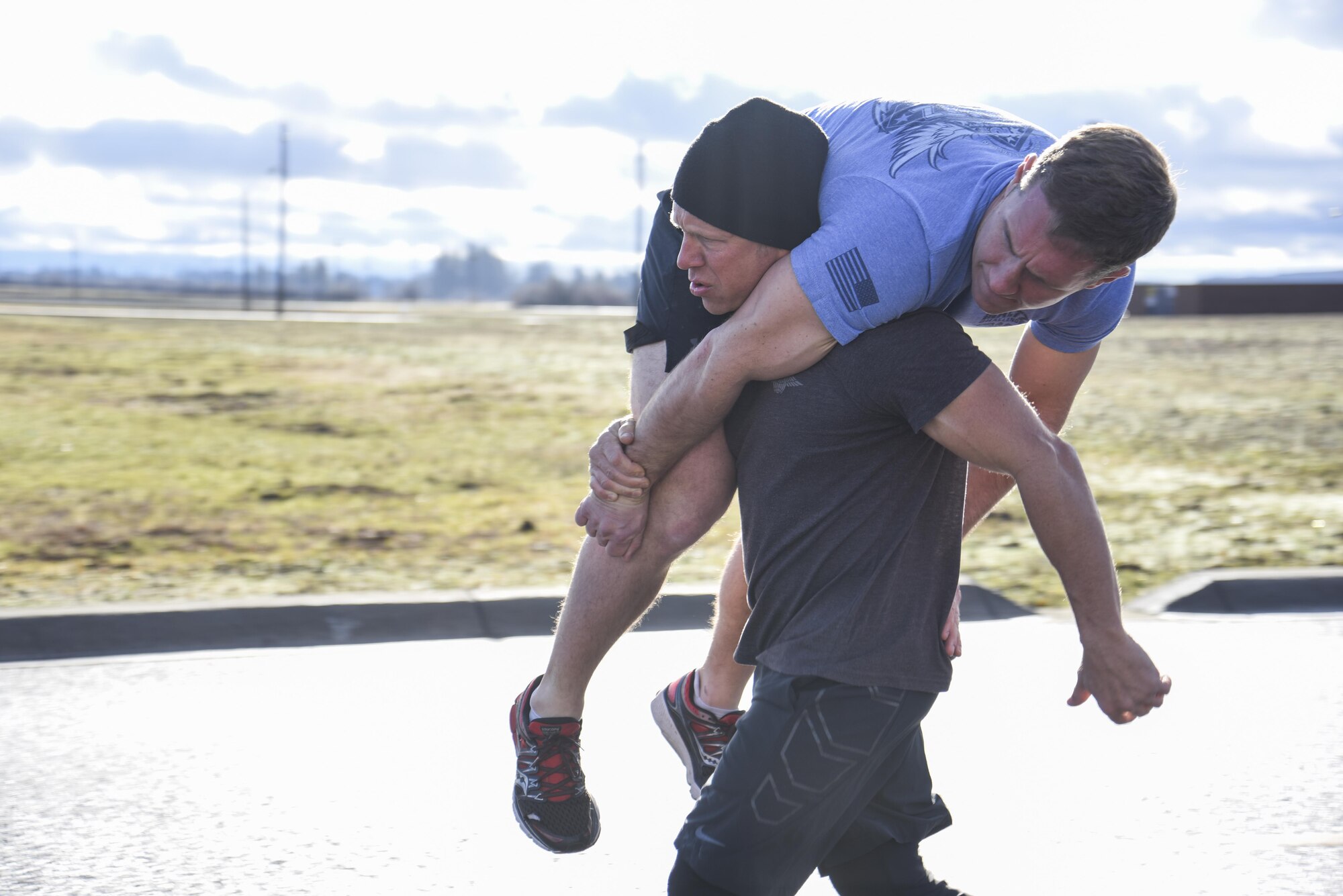 Participants complete a 100 meter fireman's carry at the 2017 Maltz Challenge. (U.S. Air Force photo/2nd Lt. Katherine Miranda)
