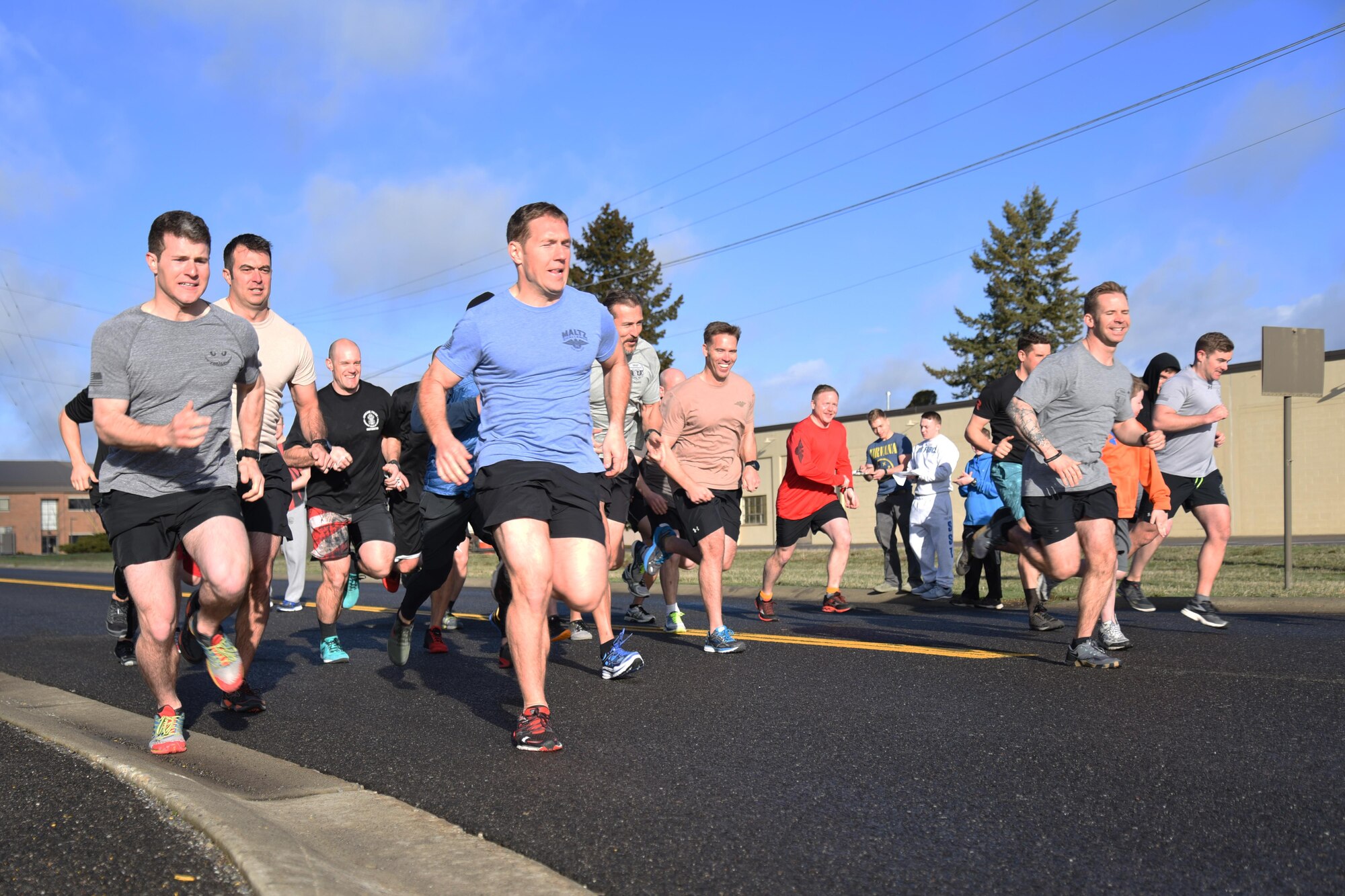 Competitors at the 2017 Maltz Challenge take off on a 400 meter run to kick off the workout. (U.S. Air Force photo/2nd Lt. Katherine Miranda)