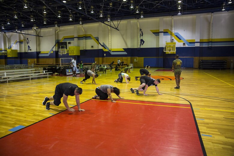 U.S. Marines in the Force Fitness Instructors program do physical training on the final day of an eight-week course at Marine Corps Air Station Iwakuni, Japan, March 17, 2017. These Marines were the first to take the course at MCAS Iwakuni. The recently implemented Force Fitness Instructors are capable of designing individual and unit-level holistic fitness programs, and they serve as subject matter experts on physical fitness and sports-related injury prevention.