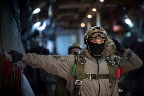 U.S. Marines with the 3rd Reconnaissance Battalion, 3rd Marine Division, 3rd Marine Expeditionary Force prepare to depart an Air Force C-130H Hercules aircraft during jump week at Yokota Air Base, Japan, March 23, 2017. The training not only allowed the Marines to practice jumping, but it also allowed the Yokota aircrews to practice flight tactics and timed-package drops. (U.S. Air Force photo by Yasuo Osakabe)
