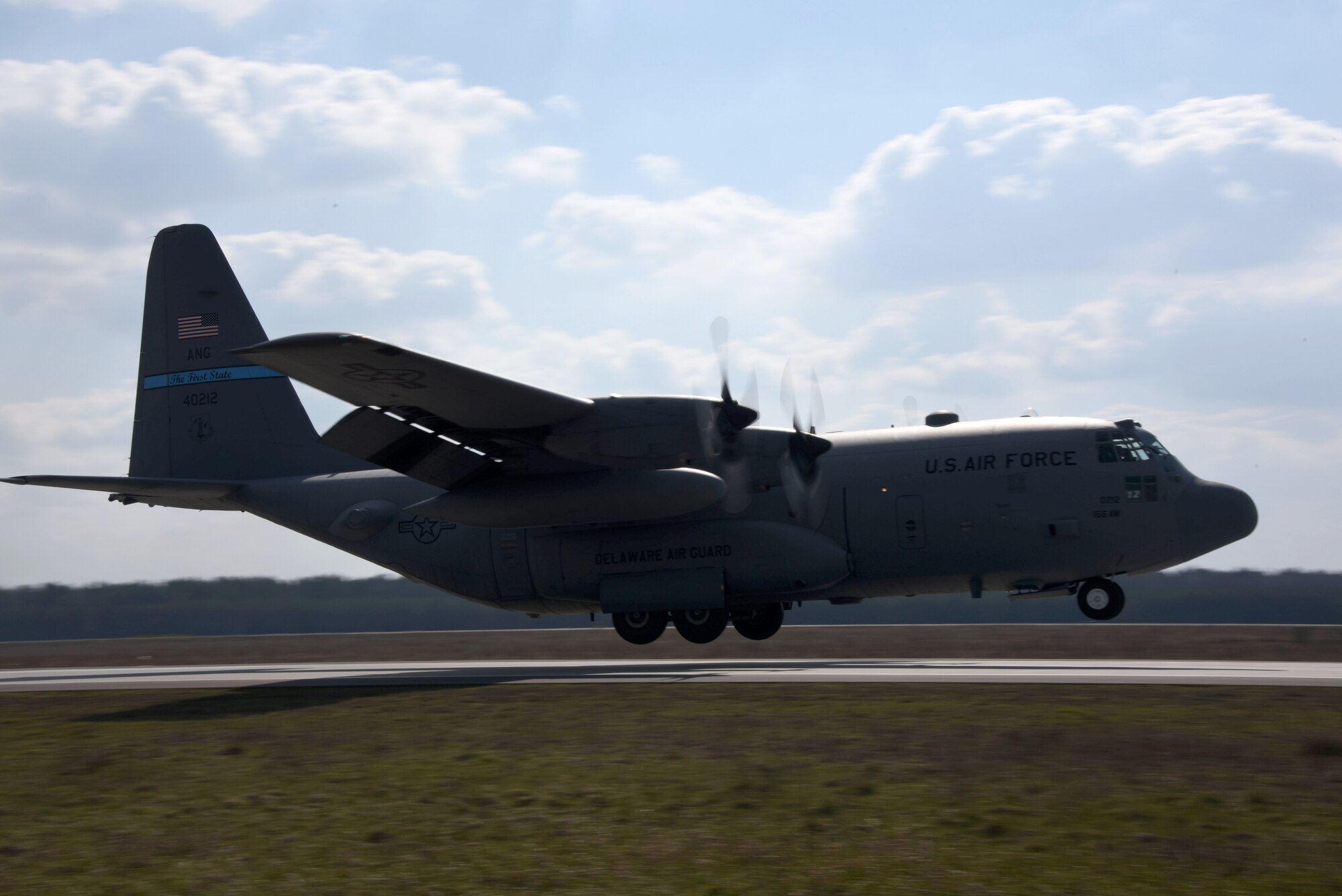 A U.S. C-130 Hercules conducts a tactical landing at Powidz Air Base, Poland, March 24, 2017.  Airmen from the U.S. and Poland participated in bilateral training during Aviation Detachment 17-2 in support of Operation Atlantic Resolve.  These bilateral trainings focused on maintaining joint readiness while building interoperability.  (Air National Guard photo by Staff Sgt. Alonzo Chapman/Released).