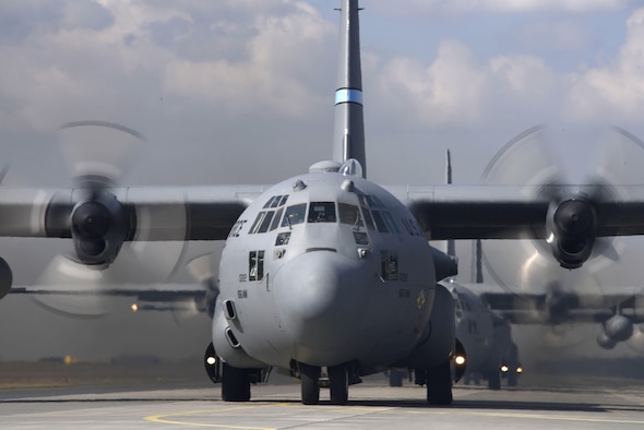 U.S. and Polish C-130 Hercules aircraft prepare to fly a 4-ship formation at Powidz Air Base, Poland, March 24, 2017.  Airmen from both countries participated in bilateral training during Aviation Detachment 17-2 in support of Operation Atlantic Resolve.  These bilateral trainings focused on maintaining joint readiness while building interoperability.  (Air National Guard photo by Staff Sgt. Alonzo Chapman/Released).