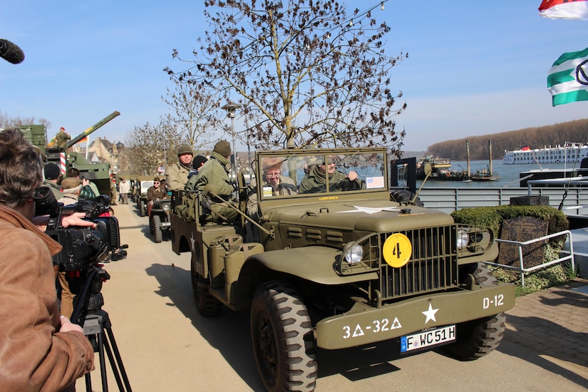 World War II re-enactors drive a Jeep along the Rhine River Saturday, March 24, 2017 in Nierstein, Germany. Americans and Germans gathered for the dedication ceremony for a monument to the 249th Engineer Combat Battalion’s efforts at the end of World War II, building a bridge across the river near Nierstein during an operation that helped shorten the war.