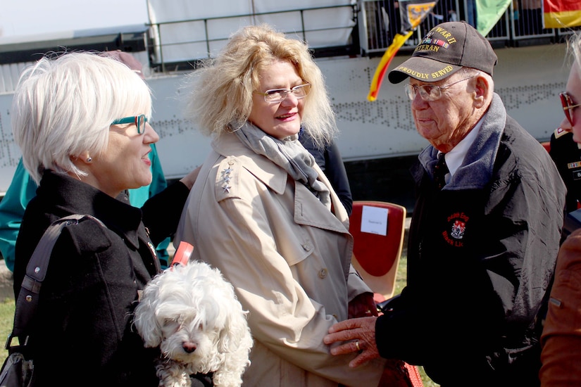 Helen Patton, left, the granddaughter of U.S. Army Gen. George Patton and Catherine Rommel, center, the granddaughter of German Field Marshall Erwin Rommel, speak to Robert Shelado, right, a World War II veteran who was present for the crossing of the Rhine River at Nierstein, Germany, Saturday, March 24, 2017 in Nierstein Germany. Americans and Germans gathered for the dedication ceremony for a monument to the 249th Engineer Combat Battalion’s efforts at the end of World War II, building a bridge across the river near Nierstein during an operation that helped shorten the war. 
