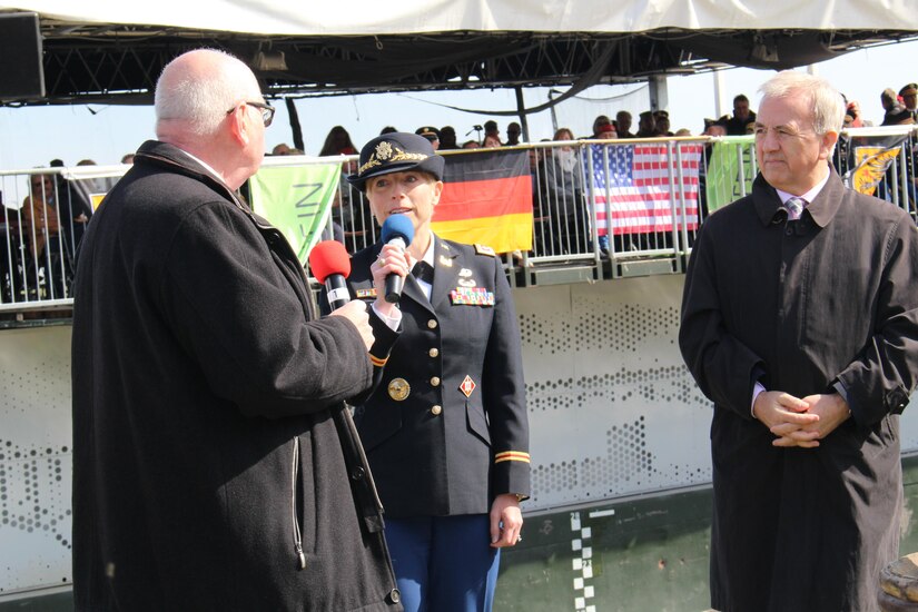 Lt. Col. Julie Balten, commander of the modern-day 249th Engineer Battalion (Prime Power) speaks to Nierstein city officials during the monument dedication ceremony Saturday, March 24, 2017 in Nierstein, Germany. Americans and Germans gathered for the dedication ceremony for a monument to the 249th Engineer Combat Battalion’s efforts at the end of World War II, building a bridge across the river near Nierstein during an operation that helped shorten the war.