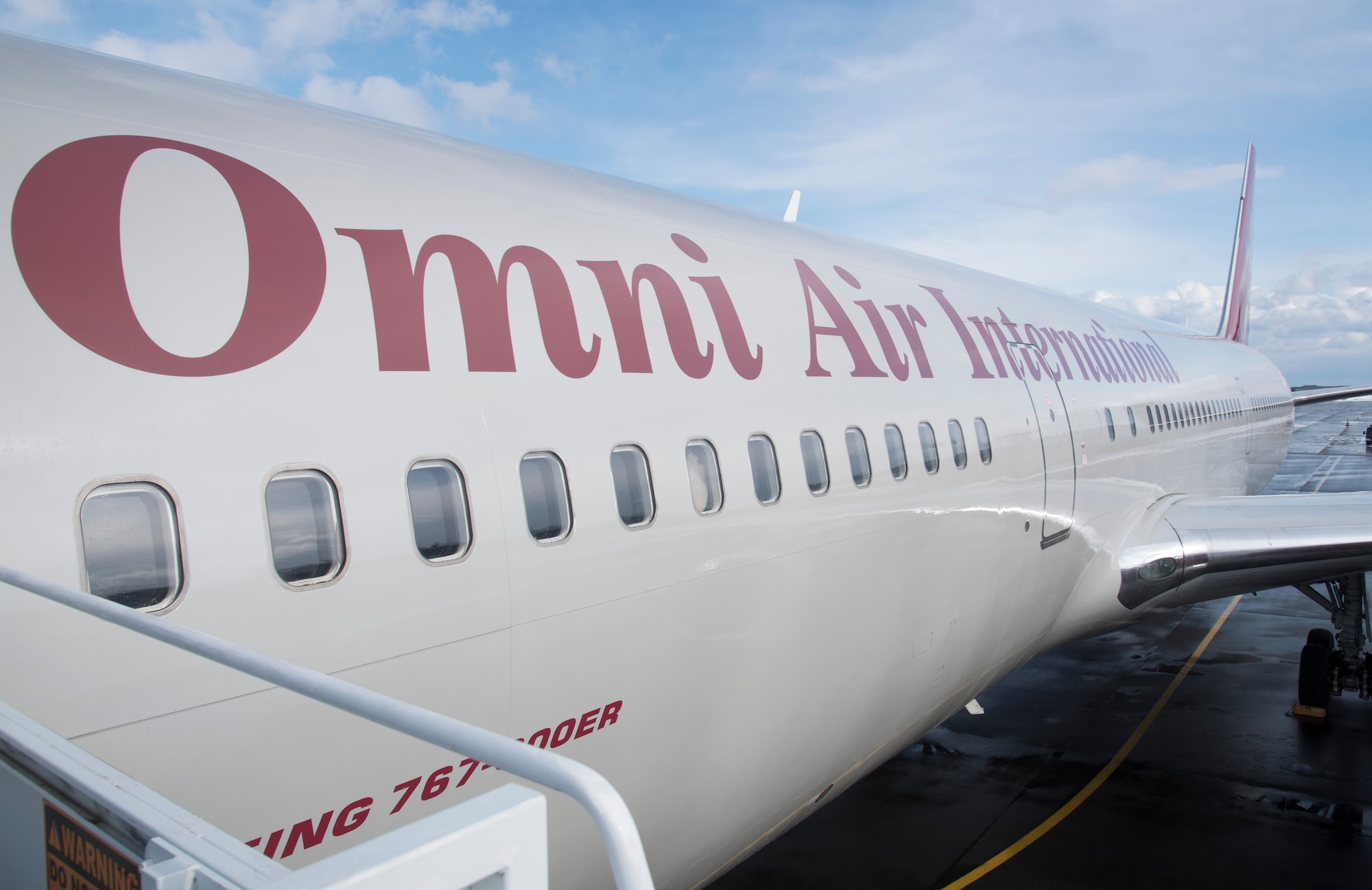 A Boeing 767-800ER aircraft sits on the flightline at Misawa Air Base, Japan, Jan. 23, 2017. For a list of bases who offer Space-Available, visit the www.amc.af.mil website. The plane landed drop-off passengers to Misawa. (U.S. Air Force photo by Airman 1st Class Sadie Colbert)