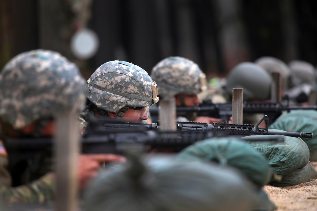 Guardsmen fire M4 rifles during the marksmanship portion of the Best Warrior competition at Joint Base McGuire-Dix-Lakehurst, N.J., March 27, 2017. Air National Guard photo by Master Sgt. Matt Hecht