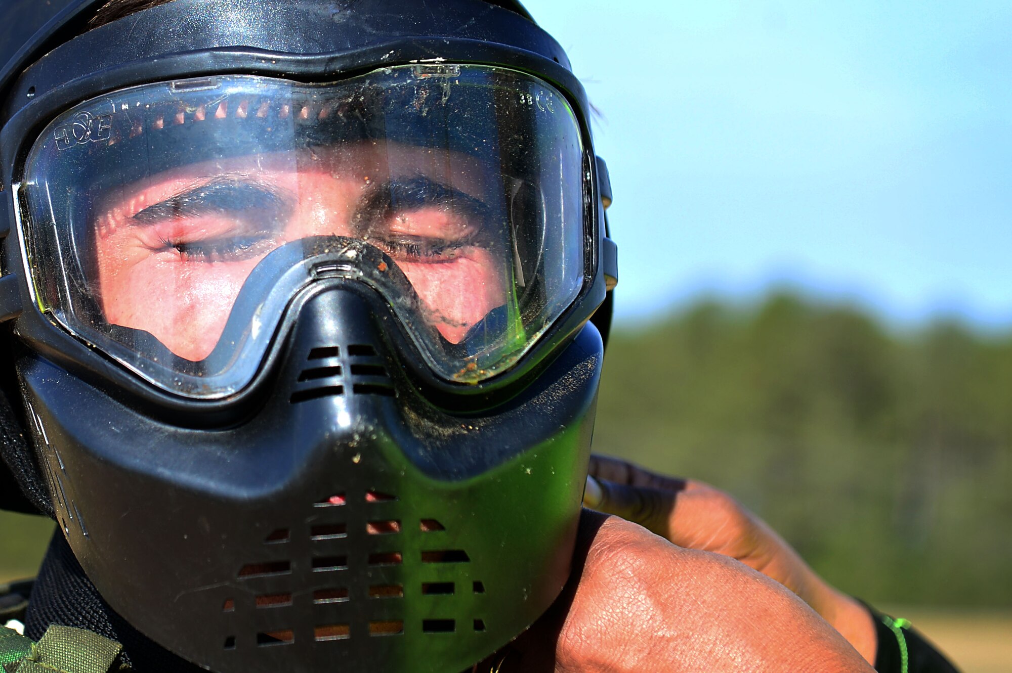 U.S. Air Force Staff Sgt. Zachary Nolan, 20th Component Maintenance Squadron aerospace propulsion technician, dons his protective gear during a 20th Security Forces Squadron Combat Challenge at Shaw Air Force Base, S.C., March 24, 2017. Airmen participating in the course arrived to a combat training facility called the “shoot house,” and were required to put on a face protector, neck guard and flak vest before firing rubber rounds.  (U.S. Air Force photo by Airman 1st Class Christopher Maldonado)
