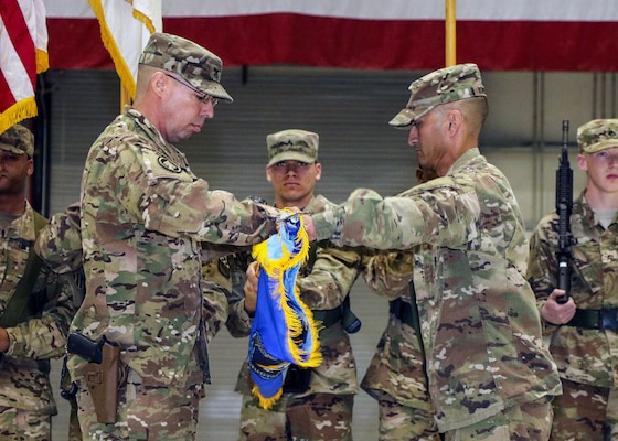 BAGRAM AIRFIELD, Afghanistan (Mar. 26, 2017) - U.S. Army Col. Mark A. Colbrook and Command Sgt. Maj. Lee K. Yoneyama case the Task Force ODIN unit colors during the transfer of authority ceremony held here today.  TF ODIN transferred the Afghanistan-theater Intelligence, Surveillance, and Reconnaissance mission to TF Lightning (525th E-MIB). Colbrook and Yoneyama are the TF ODIN commander and command sergeant major.

Photo by Jet Fabara, U.S. Forces Afghanistan Public Affairs.