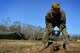 U.S. Marine Corps Lance Cpl. Abdiel Villa, Marine Wing Support Detachment 31 data technician, stationed at Marine Corps Air Station Beaufort, S.C., digs a trench for communication lines at Poinsett Electronic Combat Range near Wedgefield, S.C., March 23, 2017. Villa along with other data technicians provided communication links for Marines in the week-long simulated deployment. (U.S. Air Force photo by Airman 1st Class Christopher Maldonado)