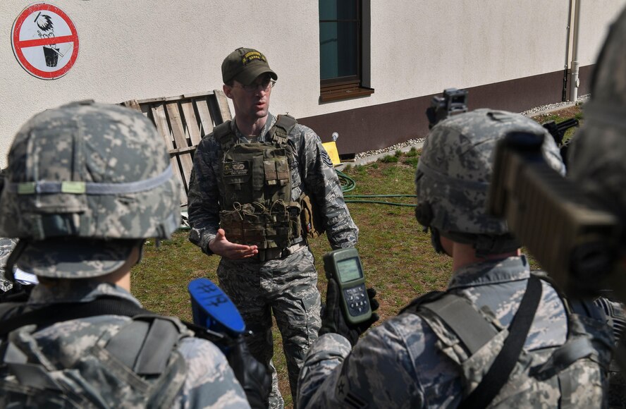 Staff Sgt. Cyle Lamoureux, 435th Security Forces Squadron Ground Combat Readiness Training Center instructor, briefs students on how to use a defense advanced GPS receiver during the DAGR training portion of the Security Operations Course on Ramstein Air Base, Germany, March 25. 2017. The two-week course began March 24 and provides pre-deployment training to security forces Airmen who will be going downrange Airmen assigned to the 86th SFS, 422nd SFS, 100th SFS, and 569th U.S. Forces Police Squadron participated in the course. (U.S. Air Force photo by Senior Airman Tryphena Mayhugh)