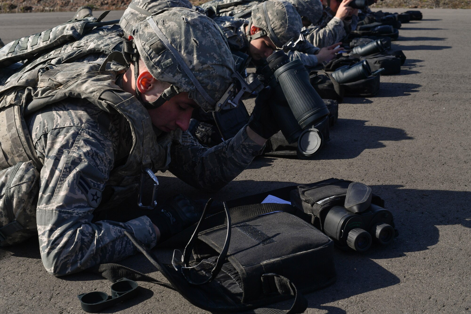 Airman 1st Class Paul Deitz, 569th U.S. Forces Police Squadron patrolman, writes down his calculations for the distance of target during the range calculation portion of the 435th Security Forces Squadron’s Ground Combat Readiness Training Center’s Security Operations Course on Ramstein Air Base, Germany, March 25, 2017. Students were required to accurately calculate target’s distance three separate ways during this portion of the training. Airmen assigned to the 86th SFS, 422nd SFS, 100th SFS, and 569th USFPS participated in the course. (U.S. Air Force photo by Senior Airman Tryphena Mayhugh)
