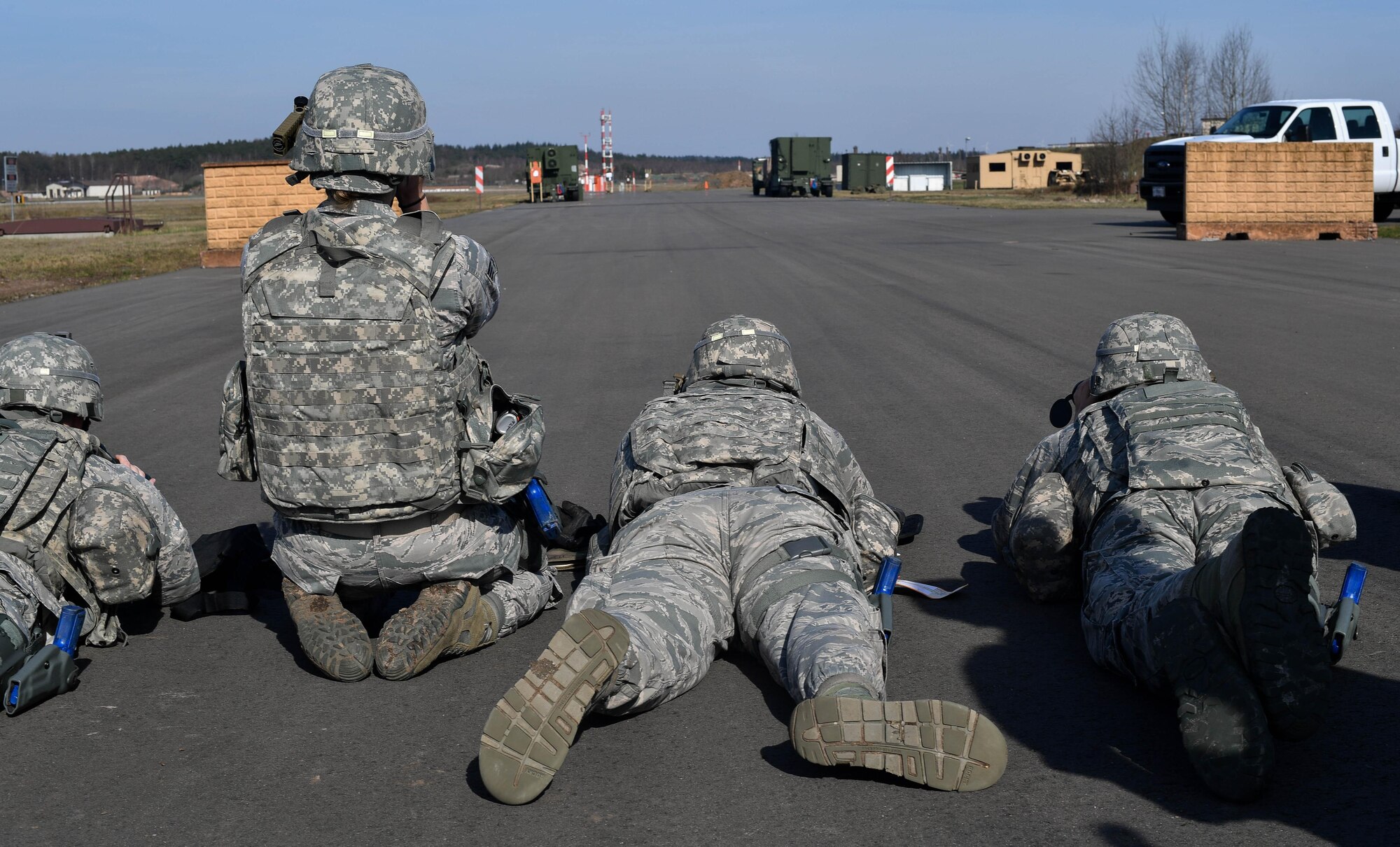 Students of the 435th Security Forces Squadron’s Ground Combat Readiness Training Center’s Security Operations Course calculate the distance of a target during the range calculation portion of the course on Ramstein Air Base, Germany, March 25, 2017. The range calculation training was one of six stations the students went through during this portion of the class. Airmen assigned to the 86th SFS, 422nd SFS, 100th SFS, and 569th U.S. Forces Police Squadron participated in the course. (U.S. Air Force photo by Senior Airman Tryphena Mayhugh)