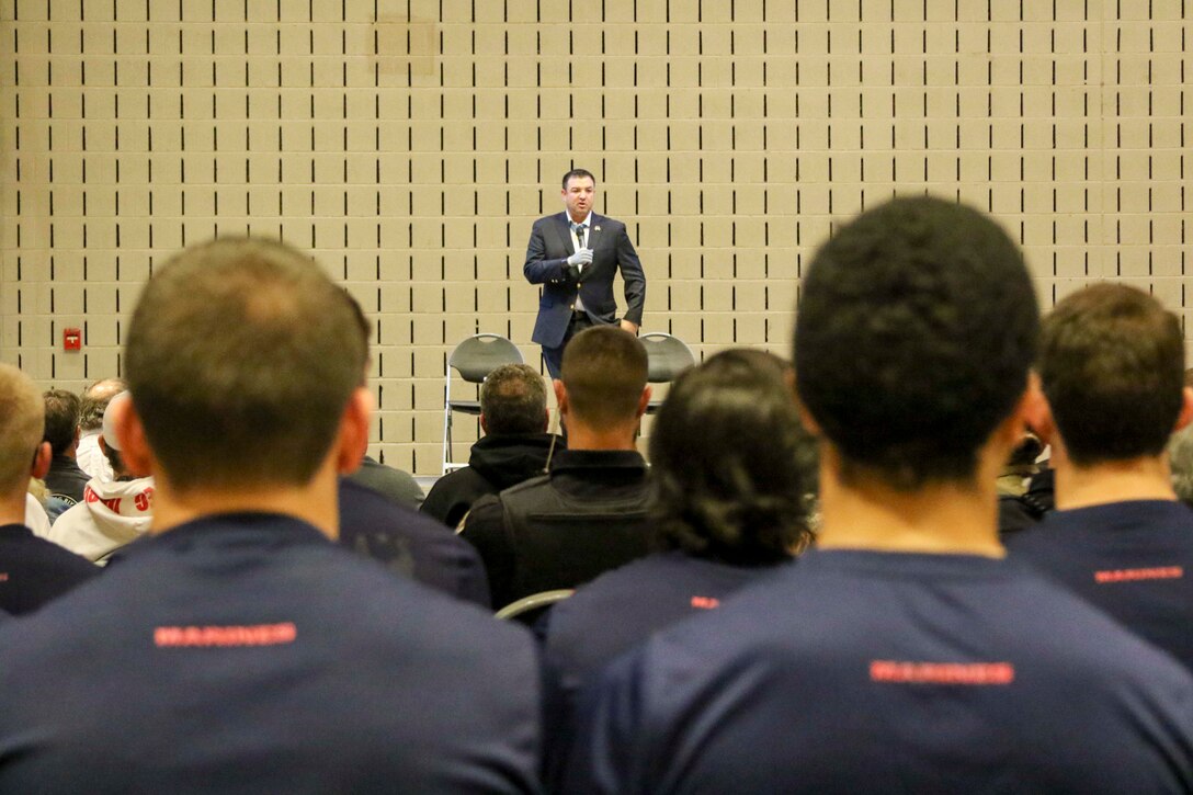 Medal of Honor recipient Master Sergeant First Class Leroy Petry (ret.) talks with a crowd of first responders and service members before the Canton Charge basketball game March 3, 2017 in Canton, Ohio. Petry talked with the crowd about what it meant to be a military member and described actions he took that lead to him being awarded the Medal of Honor. Marine Corps poolees performed an Oath-of-Enlistment before the game. (U.S. Marine Corps photo by Sgt. Stephen D. Himes/Released)