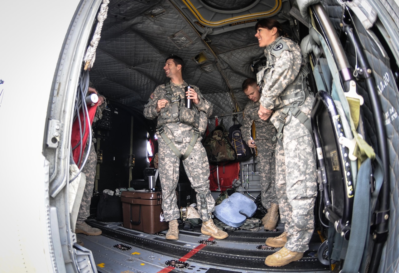 Army Chief Warrant Officer Natalie Miller and her crewmates prepare to leave for a weeklong training mission focused on high-altitude flight operations aboard a CH-47F Chinook heavy-lift cargo helicopter, Greenville, S.C., Feb. 24, 2017. Miller is assigned to the South Carolina National Guard’s 2nd General Support Aviation Battalion, 238th Aviation Regiment. South Carolina Army National Guard photo by Staff Sgt. Roberto Di Giovine