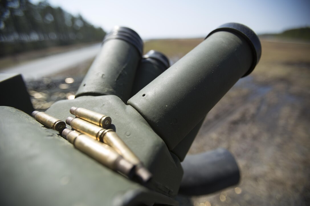 M240B machine gun shells sit atop a four-barrel smoke grenade launcher during a crew-served weapon engagement exercise at Camp Lejeune, N.C., March 21, 2017. The Marines are with 2nd Light Armored Reconnaissance Battalion, 2nd Marine Division. (U.S. Marine Corps photo by Lance Cpl. Raul Torres) 