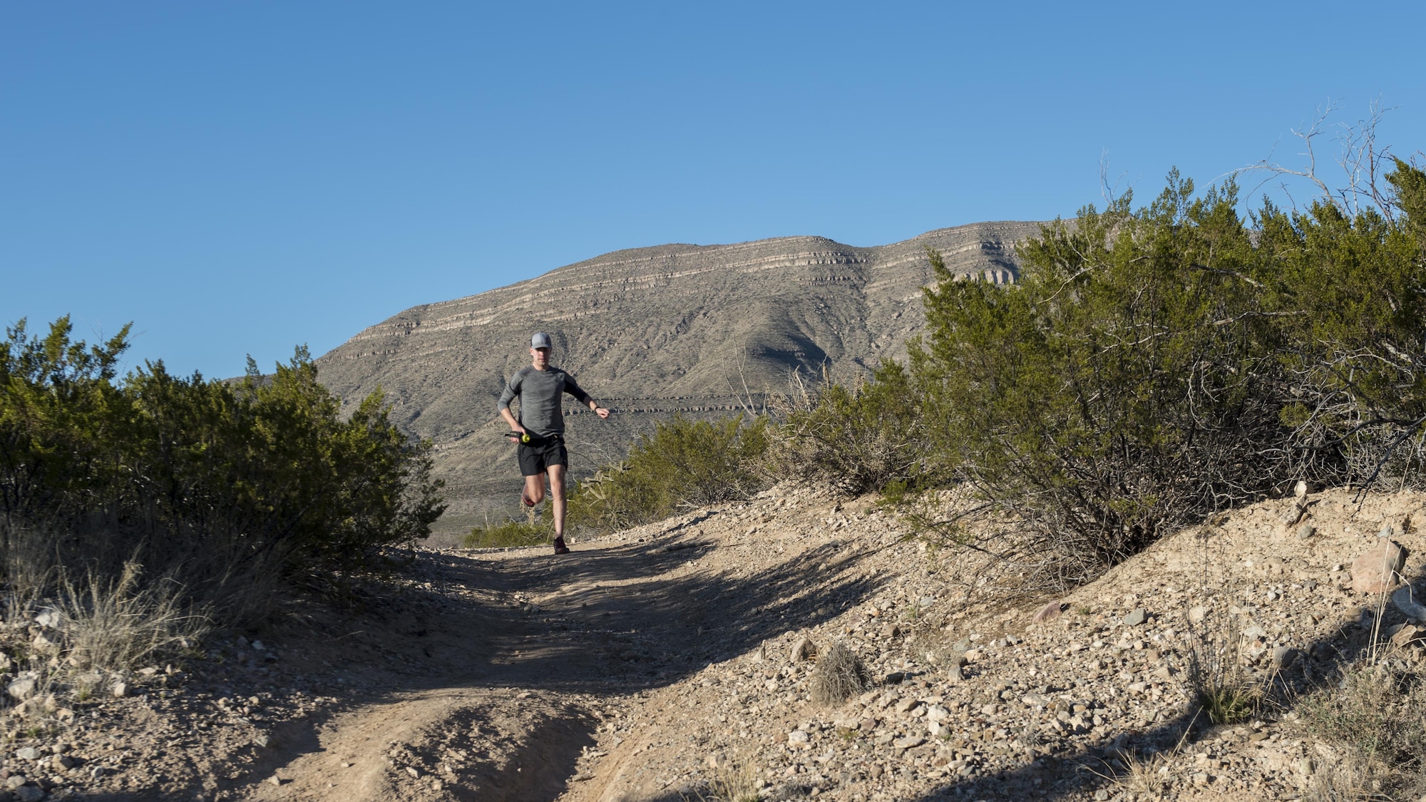 Staff Sgt. Phillip LaPoint, a 49th Maintenance Squadron stockpile technician, runs on a local trail on Feb. 15, 2017 in Alamogordo, N.M. After more than 2,000 miles worth of training, LaPoint ran and placed first in his first 50-mile ultra-marathon outside of Alexandria, Louisiana. (U.S. Air Force photo by Senior Airman Emily Kenney)
