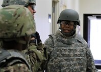 U.S. Army Reserve Sgt Will Hoebeck Jr. a Petroleum Specialist with the 373rd Combat Sustainment Support Battalion based in Beaumont, Texas, briefs the members of his crew before they enter the Reconfigurable Vehicle Tactical Trainer during Operation Cold Steel, at Fort McCoy, Wis., Mar. 21, 2017.  Operation Cold Steel is the U.S Army Reserve’s crew-served weapons qualification and validation exercise to ensure that America’s Army Reserve units and Soldiers are trained and ready to deploy on short-notice bringing combat-ready and lethal firepower in support of the Total Army and our Joint Force anywhere in the world. (U.S. Army Reserve photo by Maj. Brandon R. Mace)