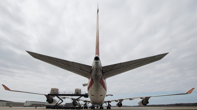 Cargo pallets are loaded onto a Kalitta Air Boeing 747 by 436th Aerial Port Squadron Airmen March 24, 2017, at Dover Air Force Base, Del. Kalitta Air, a member of the Civil Reserve Air Fleet, augments Department of Defense aircraft with long-range international capabilities. (U.S. Air Force photo by Senior Airman Zachary Cacicia)