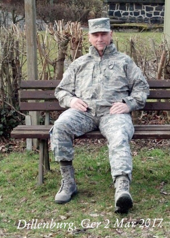 Senior Master Sgt. Dave Merris, 944th Force Support Squadron first sergeant, poses for a photo during a recent TDY to Germany to recreate a similar photo of his father taken during World War II in Dillenburg, Germany. (Courtesy photo)