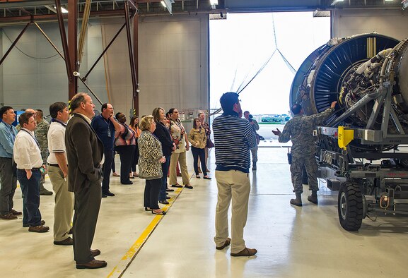 Tech. Sgt. Sean Preston, 433rd Maintenance Squadron aircraft mechanic, explains the benefits of the new C-5M engines to civic leaders from the 403rd Wing, Keesler Air Force Base, Mississippi March 24, 2017 at Joint Base San Antonio-Lackland, Texas. (U.S. Air Force photo by Benjamin Faske)