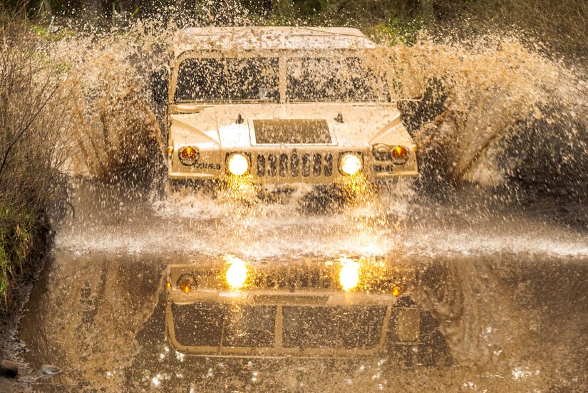 Soldiers from Headquarters and Headquarters Company, 301st Maneuver Enhancement Brigade, maneuver through difficult terrain on Joint Base Lewis-McChord, Washington March 12, 2017. The city of Tacoma, Washington, receives an average rainfall of 40 inches of rain per year (U.S. Army Reserve photo by Spc. Sean F. Harding/Released).