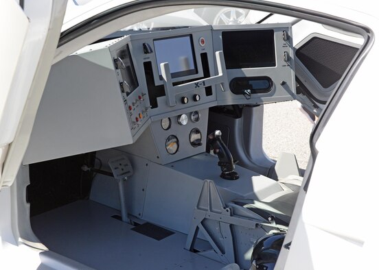 The "cockpit" of the U.S. Air Force X-1 Super Car. An Air Force Public Affairs team brought the X-1 Super Car, a heavily-modified Ford Mustang, to the L.A. County Air Show March 25-26. The X-1 travels across the country as part of a mobile marketing campaign to educate young people on the mechanical and technical career opportunities available in the Air Force. (U.S. Air Force photo by Kenji Thuloweit)