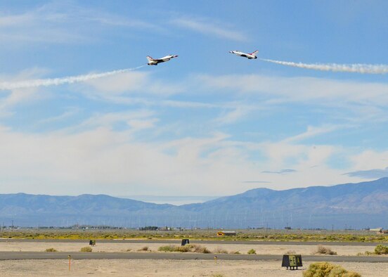 Two F-16 Fighting Falcons from the U.S. Air Force Thunderbirds Demonstration Team fly head-to-head during a practice session March 24 at General William J. Fox Airfield in Lancaster, California. The Thunderbirds highlighted both days of the 2017 L.A. County Air Show held March 25-26. (U.S. Air Force photo by Kenji Thuloweit)