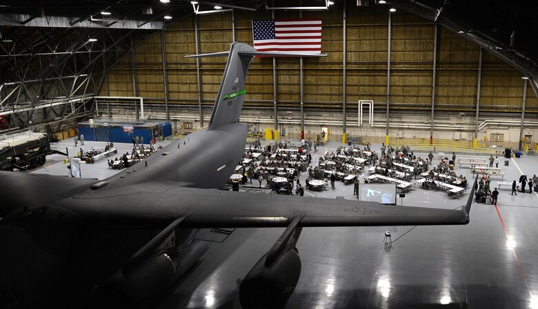 Logfest attendees 2017 socialize over a catered meal March 24, 2017, at Joint Base Lewis-McChord, Wash. More than 500 Airmen and families were in attendance to recognize this year’s Knucklebuster nominees. (U.S. Air Force photo/Senior Airman Jacob Jimenez)  