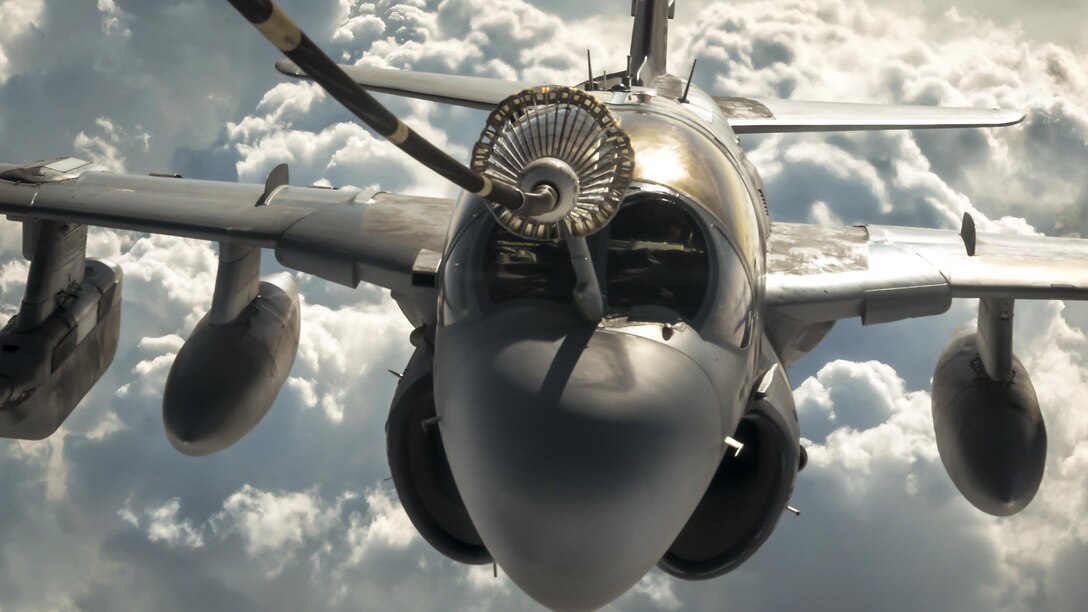 A Navy EA-6B Prowler refuels from an Air Force KC-10 Extender from the 908th Expeditionary Air Refueling Squadron during a Combined Joint Task Force Operation Inherent Resolve mission over an undisclosed location, March 20, 2017. The EA-6B provides an umbrella of protection for strike aircraft, ground troops and ships by jamming enemy radar, electronic data links and communications. Air Force photo by Senior Airman Joshua A. Hoskins