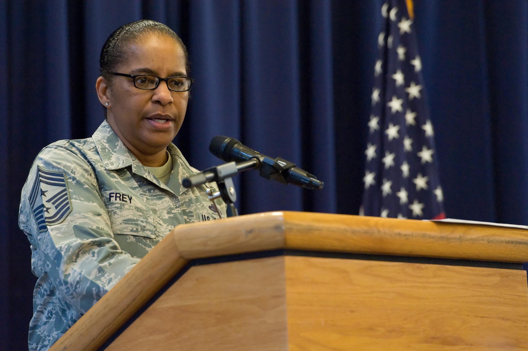 As guest speaker for the Women's History Month Breakfast, Chief Master Sgt. Shelina Frey, command chief for Air Mobility Command, Scott Air Force Base, Ill., speaks to Team Dover members March 20, 2017, at The Landings on Dover Air Force Base, Del. During her speech, Frey stated she would not be where is today without good mentors. (U.S. Air Force photo by Roland Balik)