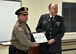 ESGR Volunteer Retired First Lieutenant Phil Albert (right) presents the Patriot Award to Captain Peter Appollonio of the West Warwick Police Department