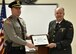 ESGR Volunteer Retired First Lieutenant Phil Albert (right) presents the Patriot Award to Captain Donald Archibald of the West Warwick Police Department