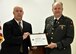 ESGR Volunteer Retired First Lieutenant Phil Albert (right) presents the Patriot Award to Captain Ernest Levigne of the West Warwick Police Department