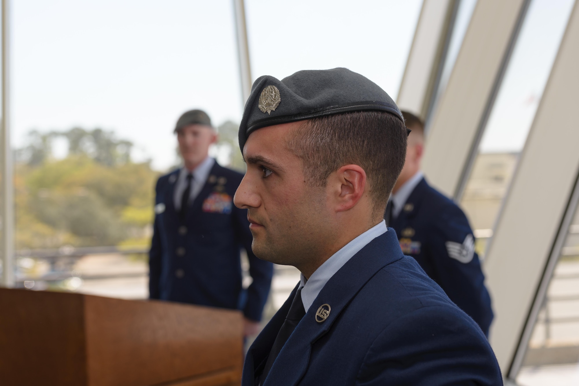 Senior Airman Matthew James, 335th Training Squadron student, receives his Gray Beret during a Special Operations Weather Apprentice Course graduation ceremony at the Weather Training Complex, March 22, 2017, on Keesler Air Force Base, Miss. At his graduation James received his Gray Beret. (U.S. Air Force photo by Andre’ Askew) 