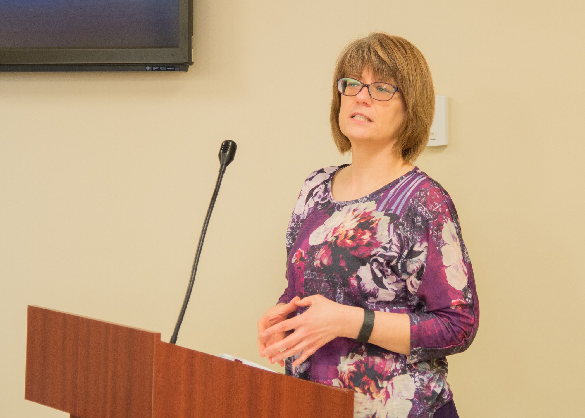 Jennifer Aubrey, Dover Air Force Base Air Force Aid Society officer speaks at the 2017 Air Force Assistance Fund campaign kickoff lunch March 17, 2017, at Dover Air Force Base, Del. Aubrey spoke about the many ways the charity organization helps Airmen in need. (U.S. Air Force photo by Mauricio Campino)