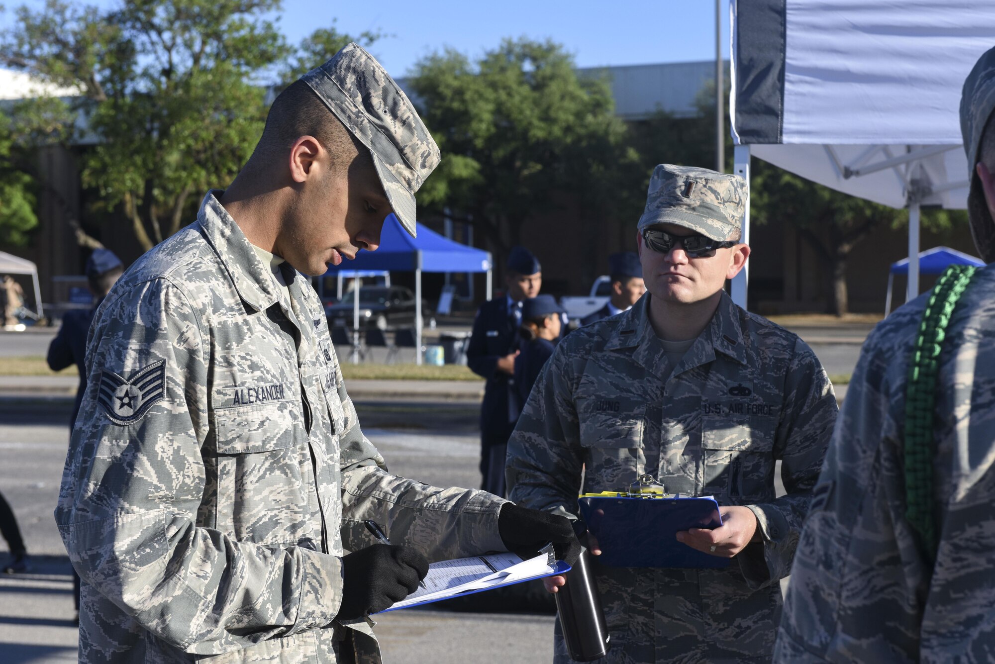 U.S. Air Force Staff Sgt. Terrence Alexander, 316th Training Squadron instructor, adds points at the 19th Annual Drill Competition at Angelo State University in San Angelo, Texas, March 25, 2017. The points were used to see which team would win the exhibition drill category. (U.S. Air Force photo by Airman 1st Class Chase Sousa/Released)