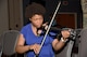 U.S. Air Force Airman 1st Class Lenay Tyler, 315th Training Squadron student, plays an electric violin during a warm-up session before Goodfellow’s Got Talent at the event center on Goodfellow Air Force Base, Texas, March 24, 2017. The talent show featured 10 acts that included poetry, singing and dancing. (U.S. Air Force photo by Staff Sgt. Joshua Edwards/Released)